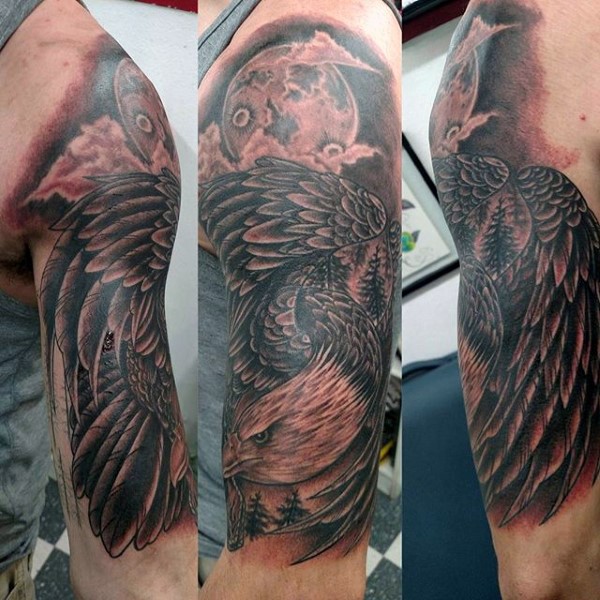 令人印象深刻的黑色鹰与月球手臂纹身图案