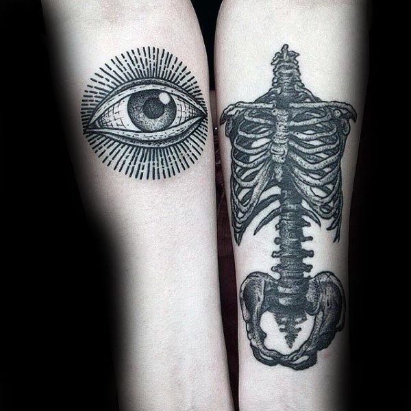 壮观的黑色点刺眼睛和人体骨骼纹身图案