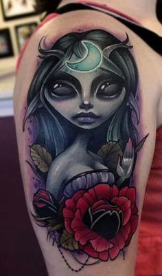 手臂彩色卡通神秘女巫与月亮花朵纹身图案