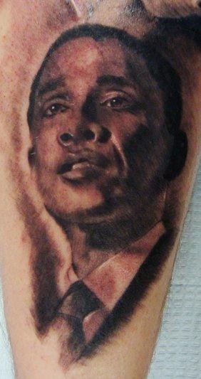 小腿黑灰风格年轻的奥巴马肖像纹身图案