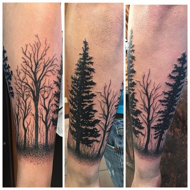 小臂令人毛骨悚然的黑色树林纹身图案