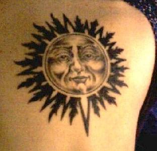 黑色太阳和人脸纹身图案