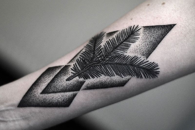 手臂黑色几何点刺和树枝纹身图案