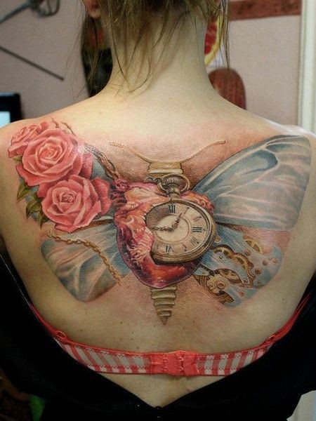 蝴蝶翅膀与玫瑰和心脏时钟纹身图案