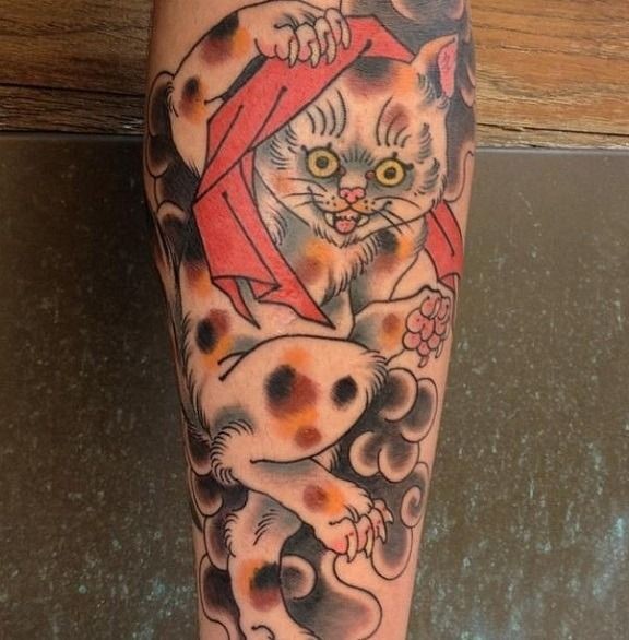 彩色斑斓的猫纹身图案