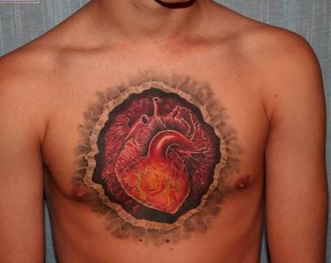 男子胸部创意皮肤撕裂心脏纹身图案