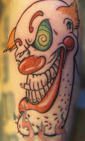 大嘴巴吸烟的小丑纹身图案