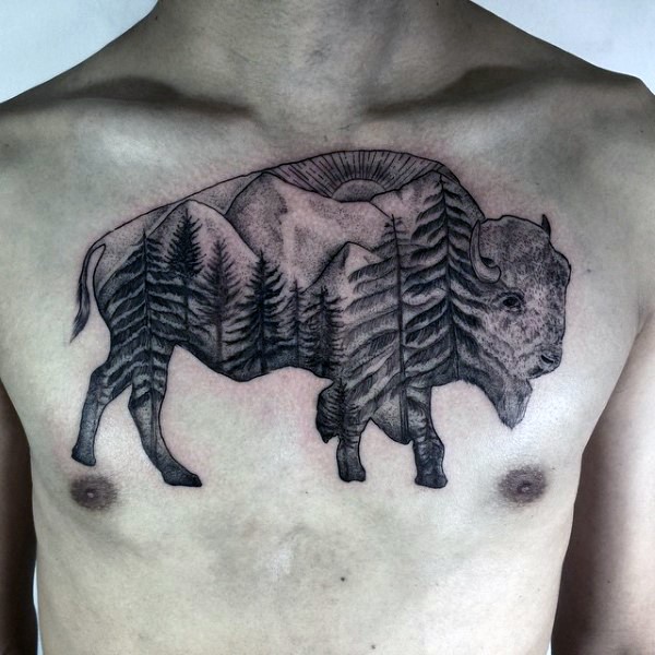 胸部黑灰牦牛与山林风景纹身图案