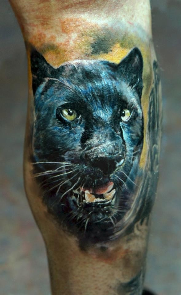 小腿黑豹头部纹身图案