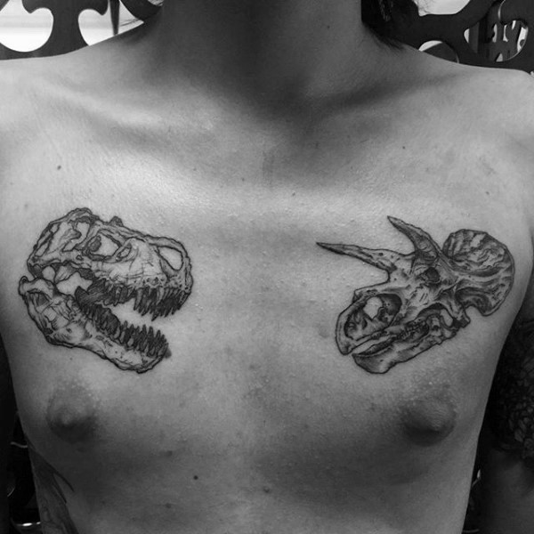 胸部经典的黑色各种恐龙头骨纹身图案
