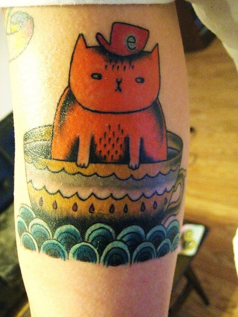 猫在茶杯里纹身图案