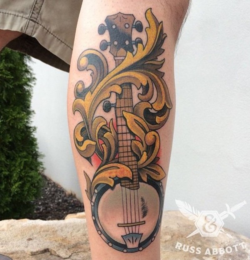 小腿彩色墨西哥吉他与装饰纹身图案