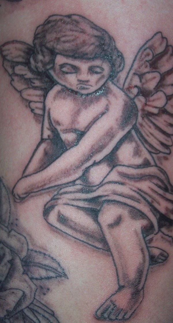 悲伤的天使纹身图案