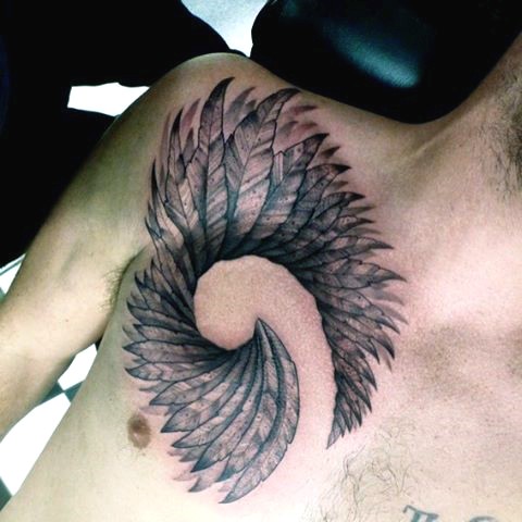 胸部黑灰有趣的羽毛环形纹身图案