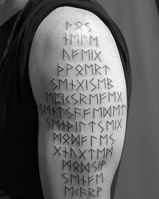 大臂古文字简单黑色纹身图案