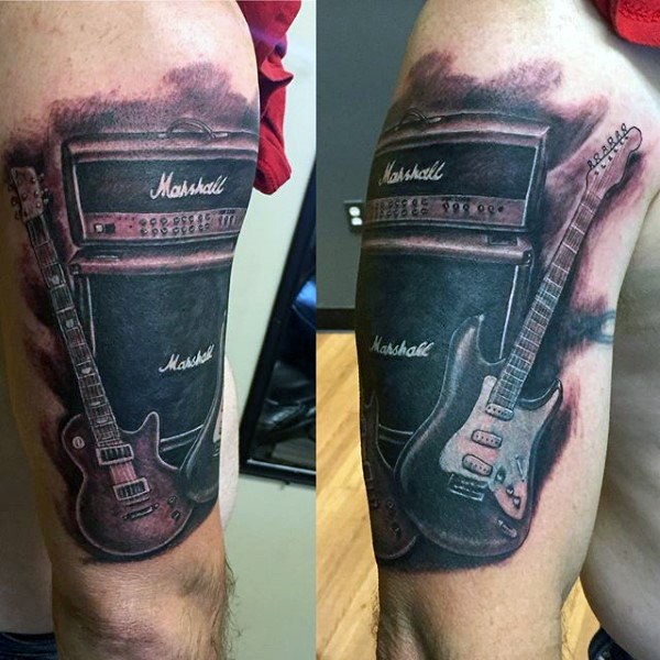 大臂现实的黑灰音响与吉他纹身图案