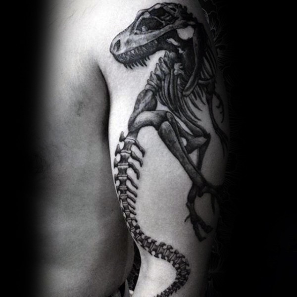 大臂黑色经典的恐龙骨架纹身图案