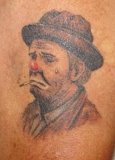 悲伤的小丑吸烟纹身图案