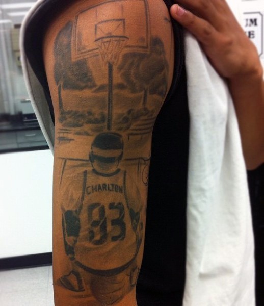 手臂黑色篮球运动员个性纹身图案