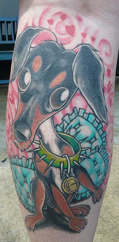 腿部彩绘滑稽的卡通狗纹身图案