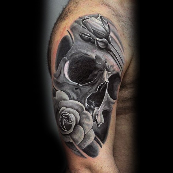 大臂奇妙的黑白骷髅与玫瑰纹身图案