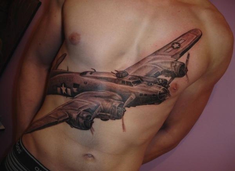 腹部写实彩色大型轰炸机纹身图案