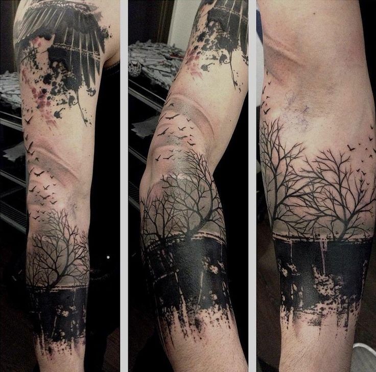 手臂经典的黑色树林与小鸟纹身图案