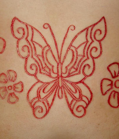 花蝴蝶割肉纹身图案