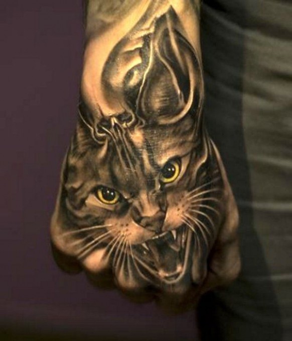 手背超现实猫与头骨纹身图案