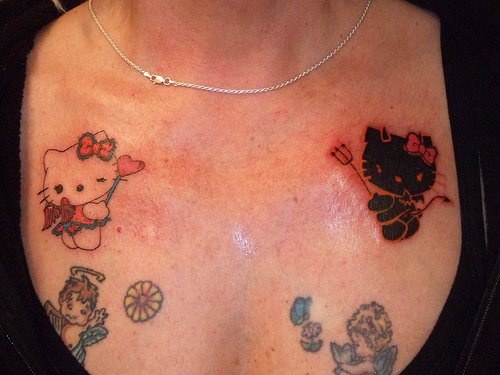 胸部卡通猫咪纹身图案