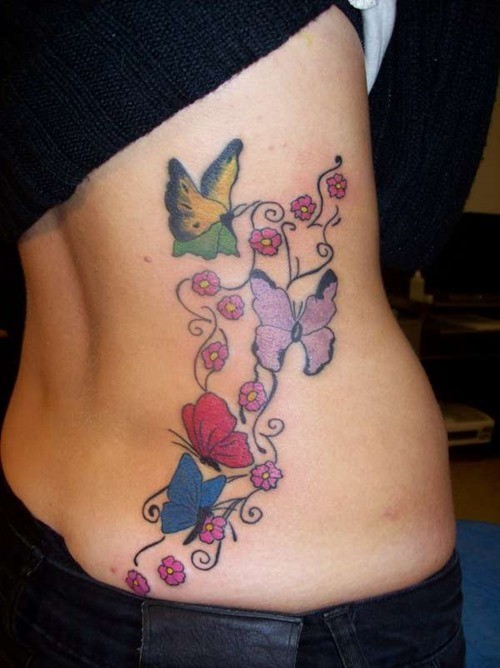 侧肋漂亮的七彩蝴蝶纹身图案