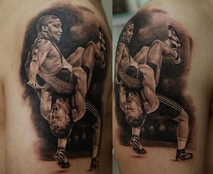 大臂黑灰摔跤运动员战斗纹身图案