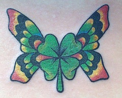 四叶草和蝴蝶翅膀纹身图案