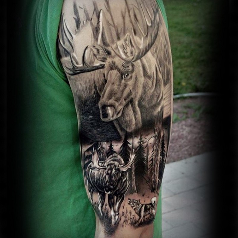大臂惊人的黑色麋鹿与狼纹身图案