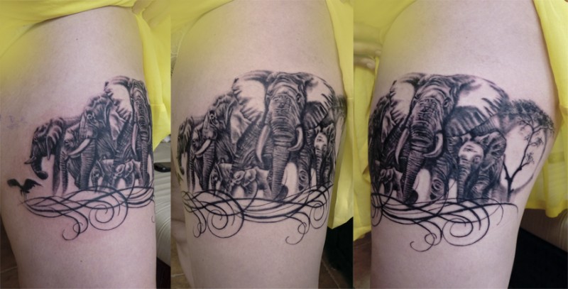 大臂好看的黑色大象家族纹身图案