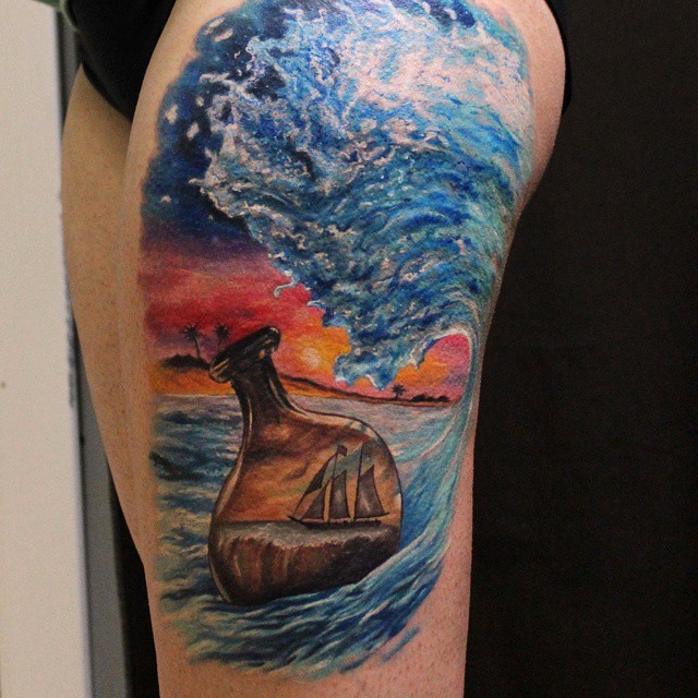 大腿彩色漂流瓶在海面纹身图案