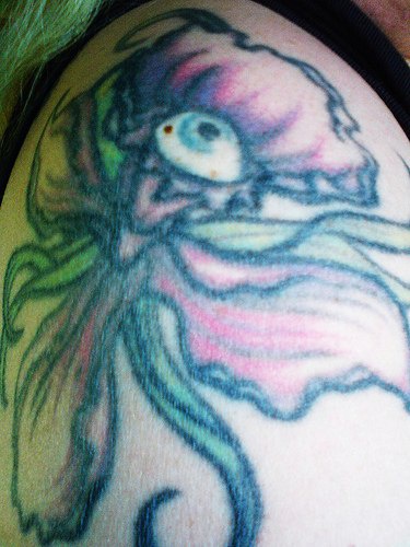 兰花和眼睛彩色纹身图案