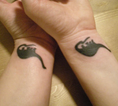 情侣手腕恐龙纹身图案