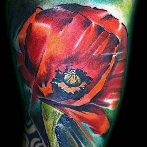 腿部彩色自然逼真的花朵纹身图片