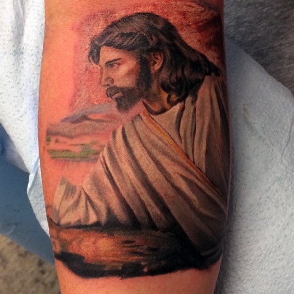 手臂彩色耶稣肖像纹身图案