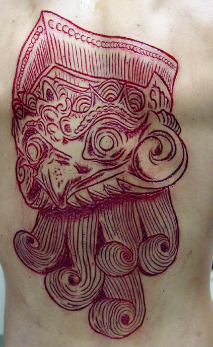 印度风鹰头割肉纹身图案