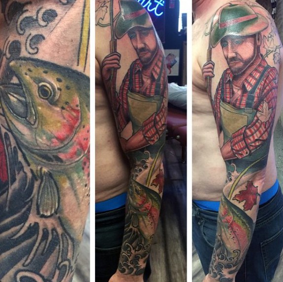 手臂彩色大渔民与鱼纹身图案