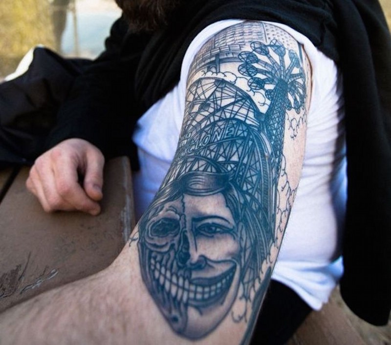 手臂滑稽的各种过山车骷髅纹身图案