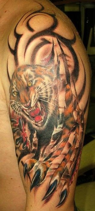 大臂令人惊叹的老虎纹身图案