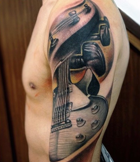 大臂有趣的设计彩色吉他纹身图案