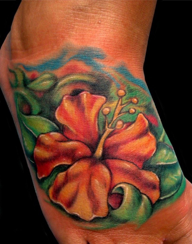 脚背橙色的木槿花纹身图案