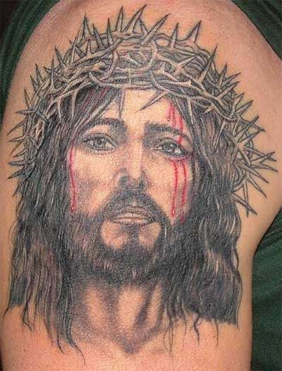 戴荆棘的流泪耶稣纹身图案