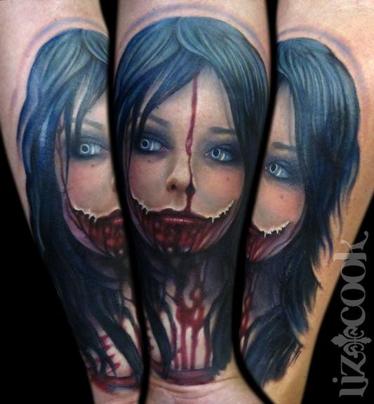 手臂彩色血腥的女人肖像纹身图案