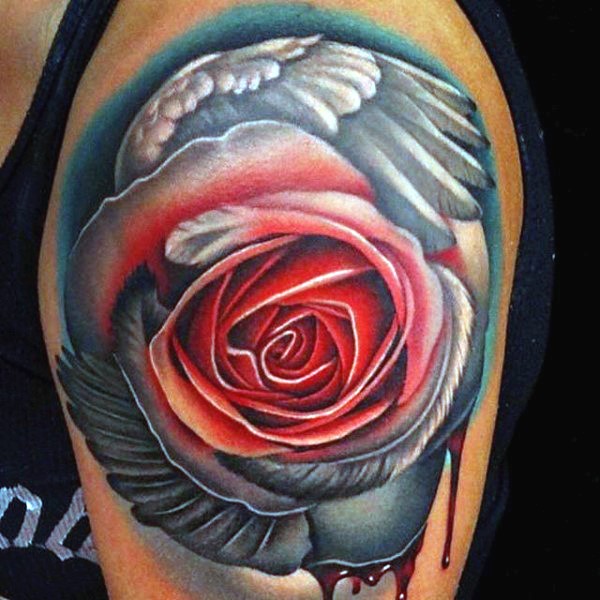 肩部华丽的彩绘玫瑰花与翅膀纹身图案