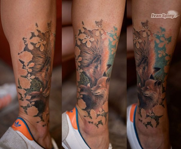 小腿狐狸家族的栩栩如生的彩色纹身图案